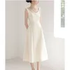 Casual Dresses Solid Color Arc Collar Line Spaghetti Strap ärmlös midja Löst sväng elegant graciös klänning för kvinnor