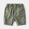 Shorts pour enfants cinquième pantalon garçons Summer Capris Baby Brass Buckle Ligne Fashion Couleur solide Génération de cheveux