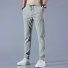 Pantalon masculin 2024 Pantal sil décontracté printemps pantalon mince et mince masculine