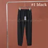 Pantalones de chándal de moda para mujeres pantalones de estilo clásico con bolsa de polvo 26993