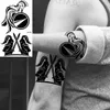 Zwarte kleine paardenbloem Fashion voeten Tijdelijke tatoeages voor vrouwen Volwassen Veather Spartan Realistische nep Tattoo Body Art Tatoo Decal 240423