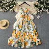 Grundläggande casual klänningar Summer Bohemian ärmlös maxi klänning kvinnor spaghetti rem hög midja gult blomma tryck semester strand long vestidos 2024