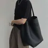 Le sac Row TR est de niche en cuir haut de gamme en cuir de grande capacité sac à grande capacité à la mode un sac de déplacement portable pour les femmes