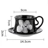 Tassen Ahunderjiaz-Retro Black Coffee Coffee Tasse und Untertasse Set Daisy Druck mit Griff Haus Dining Tabletop Dekoration Getränkware