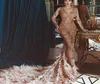 Sexig Dubai Mermaid Prom Dresses Pärlor Applique Long Sleeeves Se genom Party Dress Glamorous Lxuxry Feather Train Celebrity Even4983700