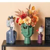 Vazen keramiek vaas menselijk hoofd abstract hol uit gezicht bloemen modern woningdecoratie arrangement sculptuur