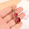 Broscher 1pc mode elegant röd violin stift lady crystal strass musikinstrument brosch stift smycken tillbehör