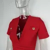 Vestidos casuales básicos diseño clásico popular sexy con cuello en v corta vecina de punto de punto de punto rojo brillante de manga corta con hombros Q240430