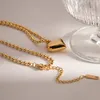 Chaines UWorld 18K Gold Color en acier inoxydable en acier inoxydable tridimensionnel Peach Heart Round perle Collier de texture féminine bijoux