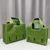 Бренд -тканые сумки дизайнер роскошные сумки для летних новая портативная большая мощность отдых для отдыха соломенная сумочка для торговых точек