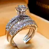 Mignon Femelle Crystal White Diamond Ring Set Luxury 925 Anneau de fiançailles en argent Anchages de mariage de mariée vintage pour femmes 234L