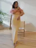 Robes décontractées de haute qualité Fashion Fashion Feath Bandage jaune robe longue 2024 Sexy sans bretelles sans brete