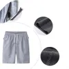 Shorts masculinos Mens esportam bolso de bolso Solid String Boit