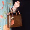 Bolso de paja de mujer tejida a mano Bambú de bambú de ratán bolsos de mimbre de verano bolsos de mimbre de té retro artesanías 240430