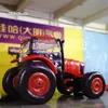 groothandel advertenties opblaasbaar landbouwtractor model 2m rode kunstmatige cultivator grote mechanische tractor voor tentoonstelling en zakelijke show