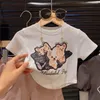 Set di abbigliamento abito da ragazza a maniche corte 2024 Summer Elegante cartone animato Stampa a cartola di grigio bianco T-shirt Pantaloni rosa Modello