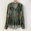 Blouses de femmes Viscose Viscose Shirt Animal imprimé floral V-Col à col lâche Elegant printemps 2024 Longue manche de conception irrégulière Blouse féminine