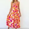 Nouvelle robe longue Slim Fit Large Hem imprimée pour les vêtements pour femmes du printemps et de l'été, robe féminine de style vacances
