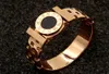 Modèles européens et américains Gâteau rond Round Numéros romains STRAP DOUBLE CROSSBAR ROSE GOLD RING MODE Titane en acier Tide FEMA6536079