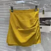 Spódnice 2024 Summer Katwalk Sexy Socialite Sible Silk Fabric Plisted Hip For Women Lśniące mini