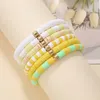 Bracelets de liaison 6pcs / ensemble Bohême coloré en polymère tissé à la main Bracelet élastique pour les femmes