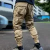 Pantalon masculin Cargo réfléchissant 2024 Hip Hop Joggers décontractés pantalons multi-poches pantalon de streme