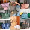 Bolsa de designer de sacola bolsas de designer de bolsas populares bolsas de bolsa feminina casual grande capacidade para mãe bolsas de compras pequenas bolsa grande bolsa ombro de lady colors praia