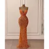 Mermaidjurken oranje sprankelende avond pailletten mouwloze spaghetti riemen ontwerper ruches op maat gemaakte formele ocn slijtage Arabische prom jurk vestidos