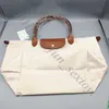 Bolsa versátil Bolsa de deslocamento corporal barato Femme Store Grande Branco 90% Capacidade Cruze Women Women 2024 ombro único outono e inverno lazer portátil 03wk