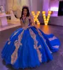 Blå quinceanera klänningar 2024 Sparkly bollklänning guldapplikationer vestidos de xv 15 anos lyx av axlar lyser sexton festklänning födelsedag söt 16 maskerad