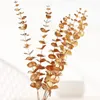 Fleurs décoratives 10pcs plantes artificielles Gold Eucalyptus Feuille verte fausse plante Diy Flower Bouquet Ornement pour la fête de mariage de Noël