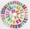 Accessoires 50pcs animaux de compagnie Chien de chien Hoies de chat Bows Clips de cheveux Modèles mixtes Hair Accessoires Conseils de chien Dog Tooth