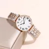 Armbanduhren Luxus Mode Römische Skala -Zifferblatt Stahlband Quarz Kleid Uhr