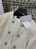Designer de Jackets femininos no início da primavera New Balm Nanyou Gaoding Celebrity Little Fragrant Style, Redutor de idade, Grand, Button Light Luxury Button Coat H38s