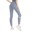 Kvinnors yogapåsar anpassar leggings med fickor hög midje sportkondition kostym lycra tyg fast färg botten byxor elastisk fitness utomhus sportbyxor 556