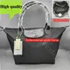 Pendler 2024 Kapazität Hochwertiger Geldbörse Billig Geschäfte Saccoche Großhandel Bag Hobo Mode große weiße Frauen -Schulter -Strandhandtasche Make -up Nylon MBMD