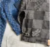 Veste imprimée de Desinger de printemps Denim toute toute nouvelle polie à revers de haute qualité Colloar Metal Buckle Couple Classic Patchwork Washed Jean Men Coats Outwear