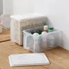 Caja de botellas de almacenamiento Mango transparente Diseño de cubierta anti-Slip Refrigerador de refrescante de plástico con tapa al por mayor