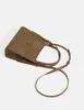 Totes 2024 NICHE DESIGNER Luxury Retro Bucket Bag Exquisite and Versatile Handbag High-End Casual Simple Shoulder Phone