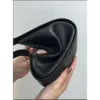 ハーフムーンの列TR新しいバッグ滑らかな革の女性デザイナーフラットショルダーストラップと湾曲したジッパー閉鎖クラッチトート高品質のブティック製品バッグ