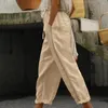 Calça feminina feminino lateral projeto oco de projeto elástico cor sólida com bolso decorativo de algodão linho calças de verão
