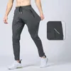 Uomini pantaloni da yoga outfit longjogger sport rapido secco tasche da ginnastica pantaloni per pantaloni da linguaggio maschi