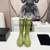 Canaux chaussures pour femmes marques designer bottes de pluie en caoutchouc bouée de genou de luxe verte rose 32 cm bottes de pluie bottes de plate-forme de pluie d'eau