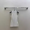 Dames T-shirtontwerper Early Spring Nieuwe Loe High Ding Koreaanse stijl Minimalistische nek Taille Wrap Solid Color Versatiele mouwloze gebreide tanktop 5DQ4