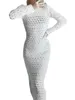 Robes décontractées Femmes Spring et automne à manches longues Couleur continue Crochet Tricoting Hollow Out Back Lace-Up Design Slim Elegant