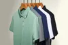 Polos pour hommes Couleur continue d'été à manches courtes à manches à manches à manches à manches à manches à manches à manches courtes à manches à manches courtes de haute qualité