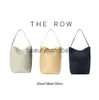 The Row TR Mens Bag Classic Tote Bag Designers Handbag Bolsa Bolsa Bolsas de Luxuros Cesta de ombros de Luxo Magidão Crista Crossbody Bag 230727