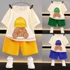 Set di abbigliamento per bambini estivi a maniche corte cortometri set waffle boys girls fumetto t-shirt t-shirt pantalone abito a due pezzi abiti casual coreani