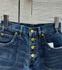 2024 Nouvelle mode d'été Shorts denim à poitrine simple Femmes Femmes hautes Poches de couleur bleue