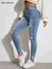 Jeans féminins bleu clair sexy skinny femmes extensible du trou de coup de pouce